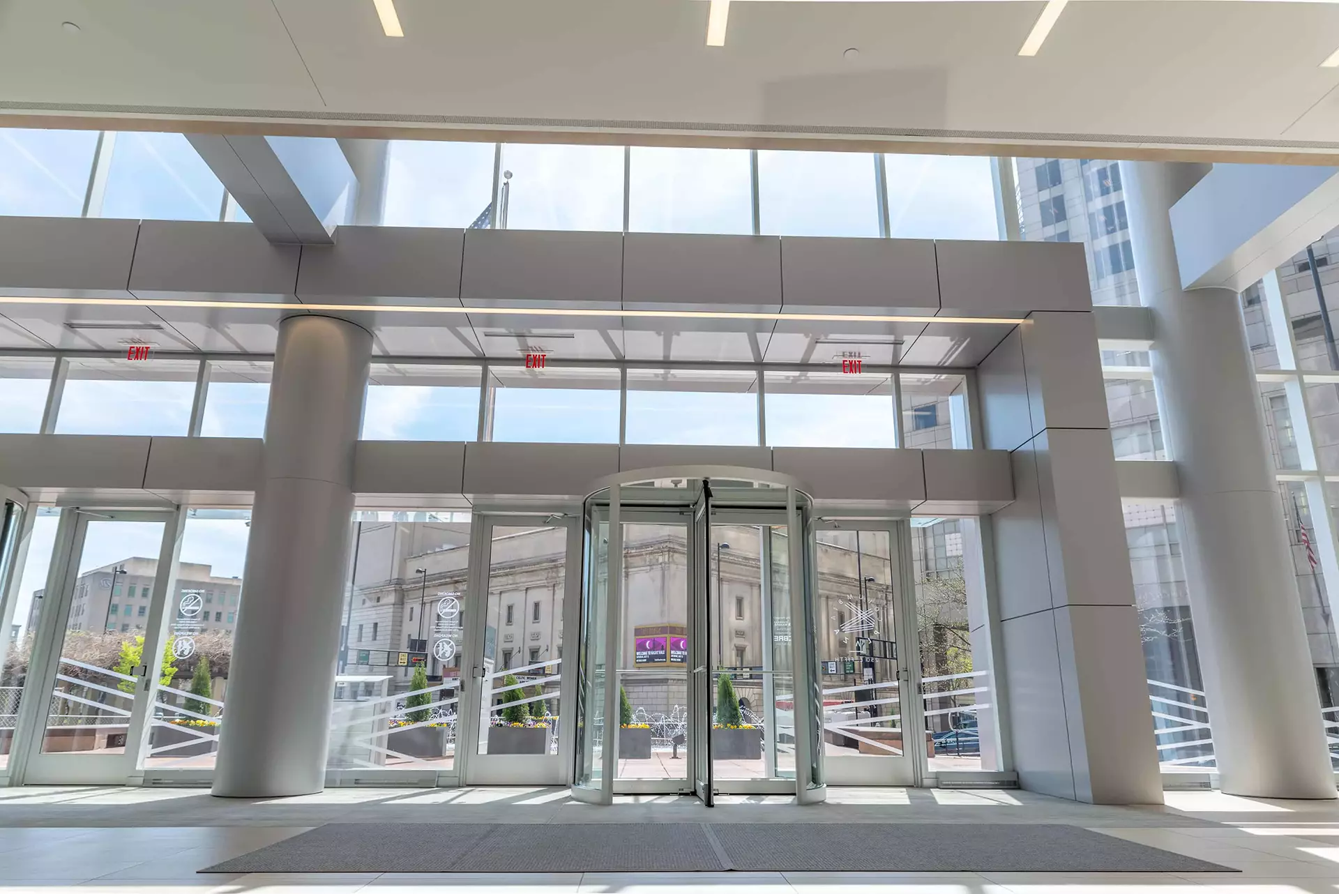 large glass windows with revolving doors